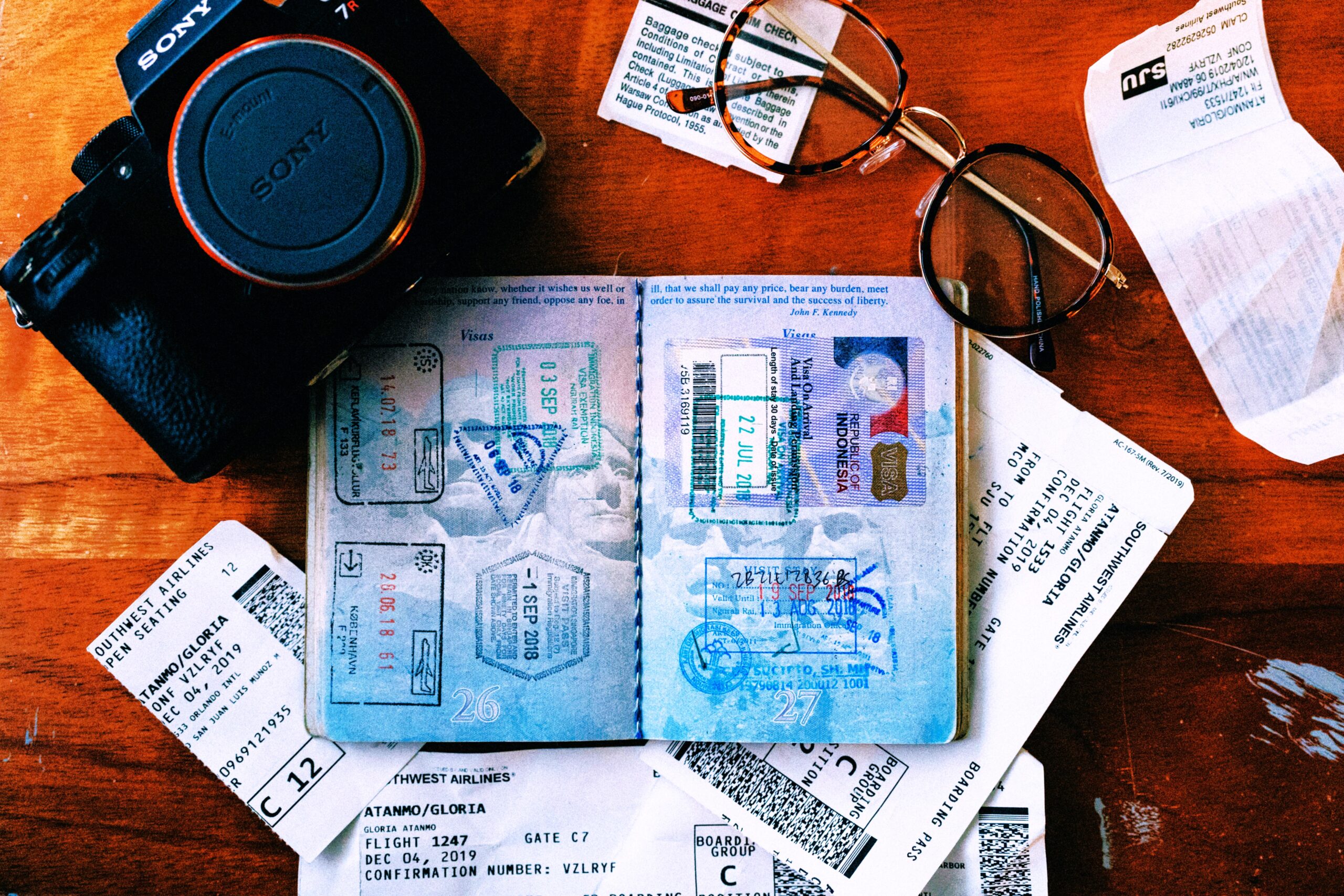 Passport, boarding passes, and travel documents for dummy ticket and visa applications