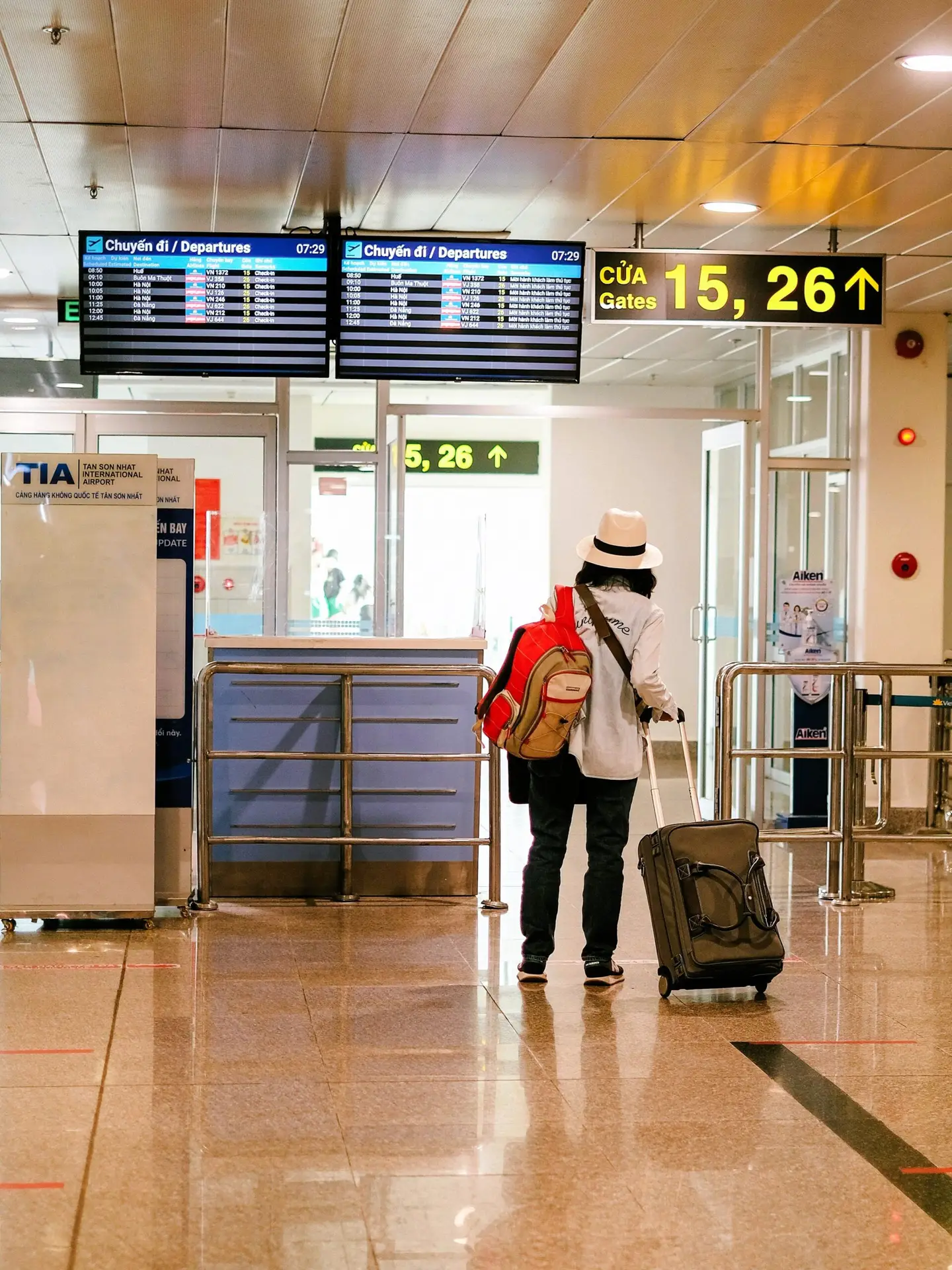 Traveller with luggage featured in dummy hotel booking