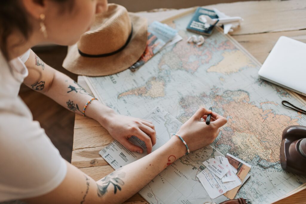 Travel documents and itinerary planning for a visa application.